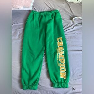 Edikted Green Sweatpants with Yellow Print